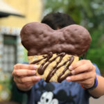 Best Snacks at Animal Kingdom in Walt Disney World - mickey chocolate chip cookie dipped in chocolate